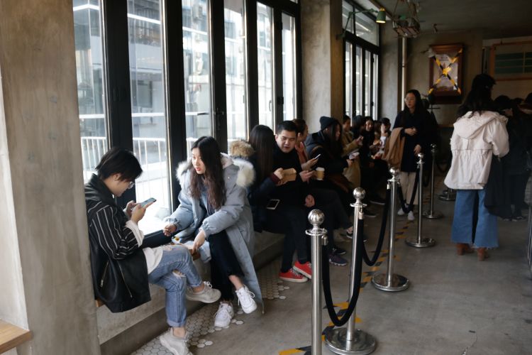 customers waiting at the shop